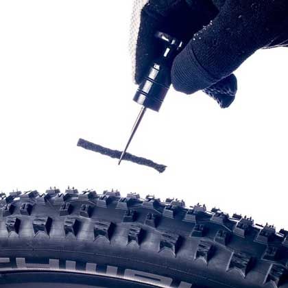 Comment réparer un pneu VTT tubeless ?